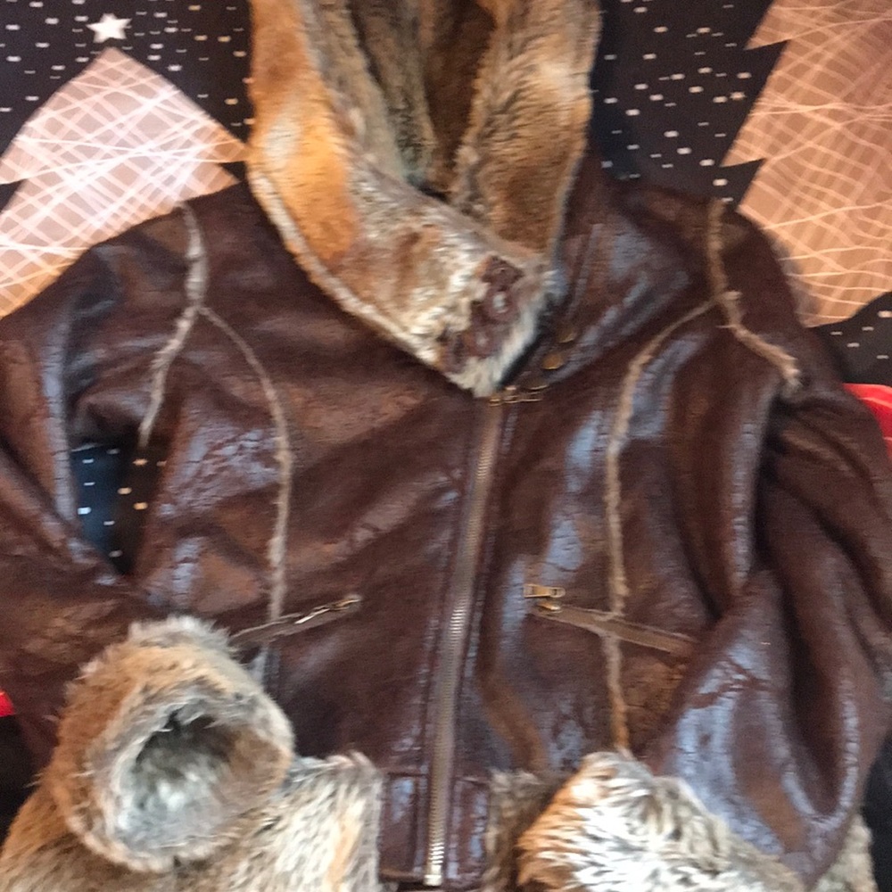 BKE distressed brown leather with fur size small.  Perfect condition